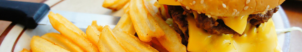 Eating Breakfast & Brunch Burger Fast Food at Fat Boy's Local Drive-In restaurant in Kailua, HI.